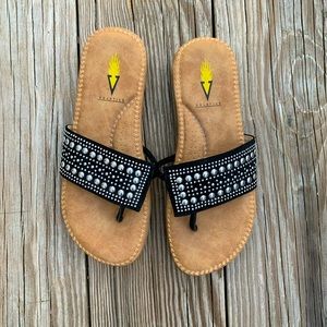 Volatile brand black silver studded flip flops size 6